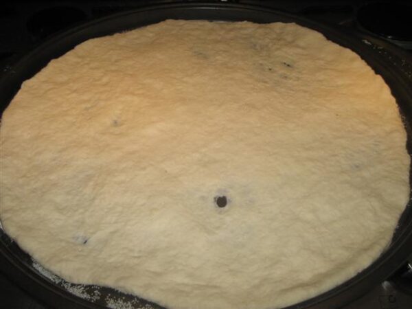 Pizzatészta a sütőlapon